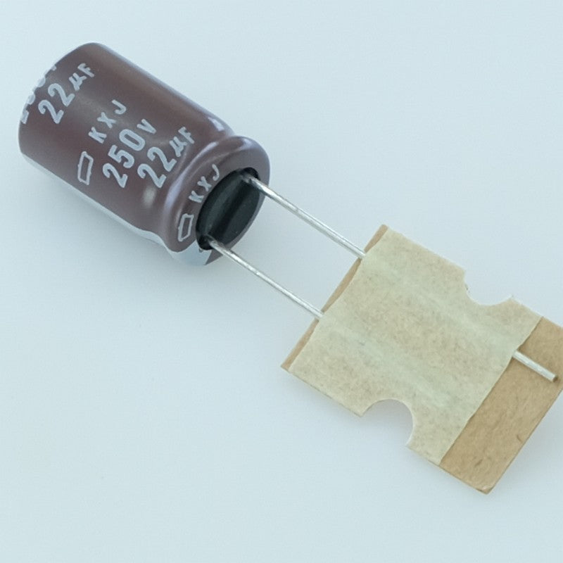 Condensateur 22µF 250V Electrolytique 10x16mm pas5 105° 20% KXJ Chemi-Con